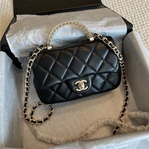 CHANEL Black Quilted Mini Bag with Gold Chain